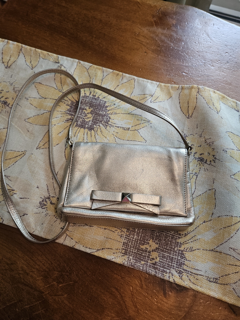 kate spade Metallic Rose Gold Crossbody with Bow Accent and Stud